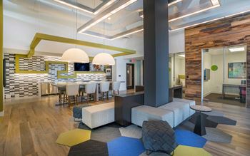Co-working lounge with private offices, conference capabilities, collaboration tables and lounge seating